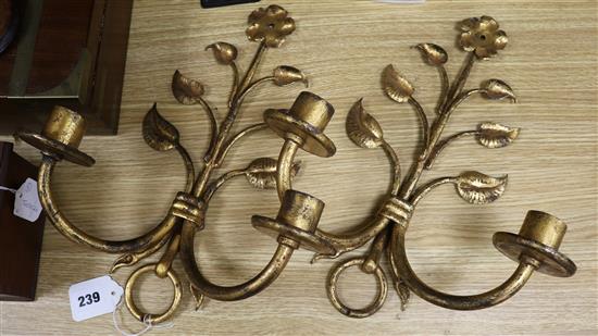 A pair of french gilt wrought iron wall sconces height 38cm